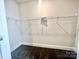 Walk-in closet with wire shelving provides ample storage space for clothes and accessories at 1035 Gardenia Dr # 51, Mt Ulla, NC 28125