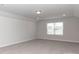 Spacious room boasts natural light through the large window at 1070 Gardenia Dr # 4, Mt Ulla, NC 28125