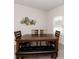 Dining room with a modern art piece, a dark wood dining table, and dark wood chairs at 1070 Gardenia Dr # 4, Mt Ulla, NC 28125