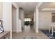 Open-concept hallway with light-colored walls and views of the dining and living areas at 1070 Gardenia Dr # 4, Mt Ulla, NC 28125