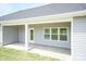 Back patio with lots of natural light, and a grassy area at 1070 Gardenia Dr # 4, Mt Ulla, NC 28125