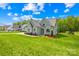 Well-maintained home with a beautifully manicured lawn and charming curb appeal at 108 Castleview Ln, Mooresville, NC 28115