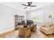 Comfortable home office with natural light, wooden desk and shelves at 108 Castleview Ln, Mooresville, NC 28115