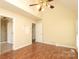 Bedroom with laminate flooring and high ceilings at 1121 Thoroughbred Nw Pl, Concord, NC 28027