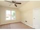 Bedroom with a window, carpet flooring, and ceiling fan at 1121 Thoroughbred Nw Pl, Concord, NC 28027