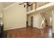 Open-concept layout featuring high ceilings and wood flooring at 1121 Thoroughbred Nw Pl, Concord, NC 28027