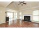 Bright living room with hardwood floors, fireplace and white trim, offering a cozy atmosphere at 1121 Thoroughbred Nw Pl, Concord, NC 28027