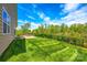 Expansive backyard offering lush greenery and ample space for outdoor activities and enjoyment at 124 Rosebay Dr, Mooresville, NC 28117