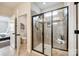 Modern bathroom featuring tile floors, a tiled shower with glass door, and toilet at 124 Rosebay Dr, Mooresville, NC 28117
