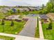 Overhead view of Community Tennis Courts, surrounded by greenery and residential homes at 124 Rosebay Dr, Mooresville, NC 28117