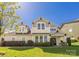Charming home with a well-manicured lawn and inviting front porch at 12942 Blakemore Ave, Huntersville, NC 28078