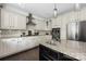 Well-equipped kitchen with granite countertops, ample cabinet space, and stainless steel appliances at 12942 Blakemore Ave, Huntersville, NC 28078