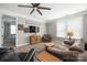 Spacious living room with comfortable seating, TV, and ample natural light at 12942 Blakemore Ave, Huntersville, NC 28078