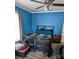 Cozy bedroom featuring hardwood floors, neutral decor, and a ceiling fan at 1306 Brantley Rd, Kannapolis, NC 28083