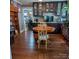 Elegant dining room featuring hardwood floors and dark wood cabinets at 1306 Brantley Rd, Kannapolis, NC 28083