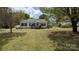 Charming home with a large front yard and inviting curb appeal at 1306 Brantley Rd, Kannapolis, NC 28083