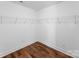 Walk-in closet with wire shelving and hardwood floors at 13453 Portside Ln, Lancaster, SC 29720