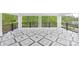 Outdoor porch boasting an eye-catching tile floor, perfect for entertaining guests at 13453 Portside Ln, Lancaster, SC 29720