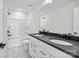 Modern bathroom featuring a double vanity with matte black fixtures at 13748 Roderick Dr # 174, Huntersville, NC 28078