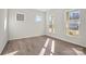 A sun-lit bedroom features luxury vinyl plank flooring and ample natural light at 13748 Roderick Dr # 174, Huntersville, NC 28078