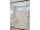 Modern walk-in shower features glass enclosure and tiled walls at 13748 Roderick Dr # 174, Huntersville, NC 28078