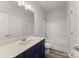 Modern bathroom features a sleek vanity, large mirror, and a shower-tub combination at 1469 Mocksville Hwy # 21, Statesville, NC 28625