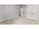 Bright bedroom with double closets, neutral walls, and soft carpeting for added comfort at 1469 Mocksville Hwy # 21, Statesville, NC 28625
