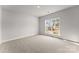Bright bedroom features a large window with a view to the exterior at 1469 Mocksville Hwy # 21, Statesville, NC 28625