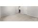 Spacious bedroom features a doorway to an ensuite bath at 1469 Mocksville Hwy # 21, Statesville, NC 28625