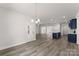 Open concept living room showcasing hardwood floors, recessed lighting and access to kitchen at 1469 Mocksville Hwy # 21, Statesville, NC 28625