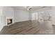 Spacious living room featuring a fireplace, hardwood floors and an open concept at 1469 Mocksville Hwy # 21, Statesville, NC 28625
