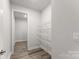 Pantry with wire shelving and hardwood floors at 1469 Mocksville Hwy # 21, Statesville, NC 28625