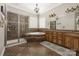 Beautiful bathroom with dual sinks, a shower, and a soaking tub at 15024 Old Vermillion Dr, Huntersville, NC 28078