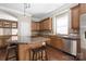 Beautiful kitchen with granite countertops, stainless steel appliances, and a kitchen island at 15024 Old Vermillion Dr, Huntersville, NC 28078