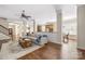 Open-concept floor plan combining the kitchen and the living room with hardwood floors at 15024 Old Vermillion Dr, Huntersville, NC 28078