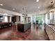 Open kitchen features a large island, and seamlessly connects with the living and dining areas at 15323 Barnsbury Dr, Huntersville, NC 28078