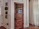 Charming pantry door with glass window and painted signage at 15323 Barnsbury Dr, Huntersville, NC 28078