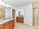 Bathroom with double vanity, granite countertops, and tiled floor at 15747 Reynolds Dr, Indian Land, SC 29707