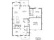 Detailed floor plan of the first floor, highlighting the layout of the kitchen, living room, and office spaces at 15747 Reynolds Dr, Indian Land, SC 29707