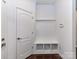 Mudroom with built-in bench, storage cubbies, and coat hooks at 15747 Reynolds Dr, Indian Land, SC 29707