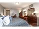 This primary bedroom suite features an ensuite and dual sink vanity at 1730 Deer St, Charlotte, NC 28214