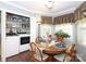 Bright breakfast nook featuring washer, dryer, and abundant natural light at 1730 Deer St, Charlotte, NC 28214