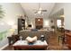 Cozy living room featuring a ceiling fan, neutral tones, and comfortable furniture at 1730 Deer St, Charlotte, NC 28214