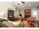 Cozy living room with vaulted ceilings, brick fireplace, and comfortable seating arrangement for relaxation at 1730 Deer St, Charlotte, NC 28214