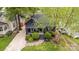 Aerial view of home highlighting landscaping, gravel driveway, and charming curb appeal at 1824 Umstead St, Charlotte, NC 28205