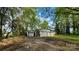 This property features detached garage with a two-car garage and a separate storage shed at 2118 Polkville Rd, Shelby, NC 28150