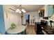 Cozy kitchen featuring a classic stove, round dining table, and quaint decor at 2118 Polkville Rd, Shelby, NC 28150
