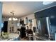 Modern kitchen featuring stainless steel refrigerator, wooden cabinets, and updated appliances at 2118 Polkville Rd, Shelby, NC 28150