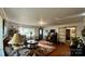 Inviting living room features hardwood floors, vintage furniture, and plenty of natural light at 2118 Polkville Rd, Shelby, NC 28150