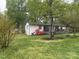 Residential backyard view with wooden deck at 212 E Stewart Ave, Mooresville, NC 28115